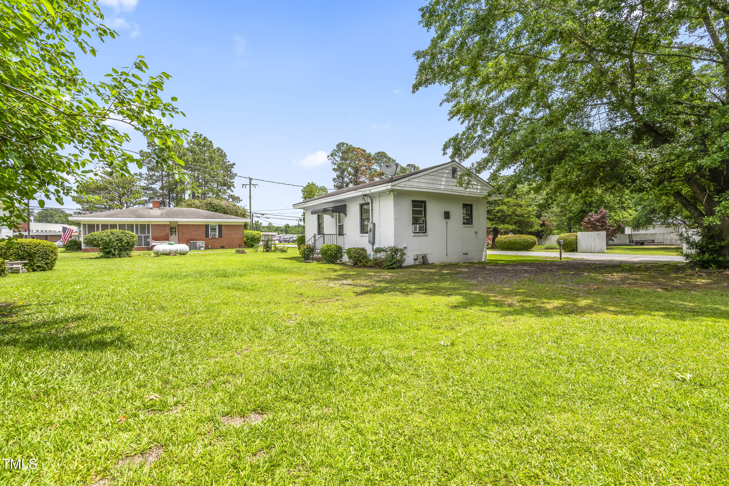 500 Rowan Road Clinton, NC 28328 - Photo 35 of 42 a front view of a house with garden