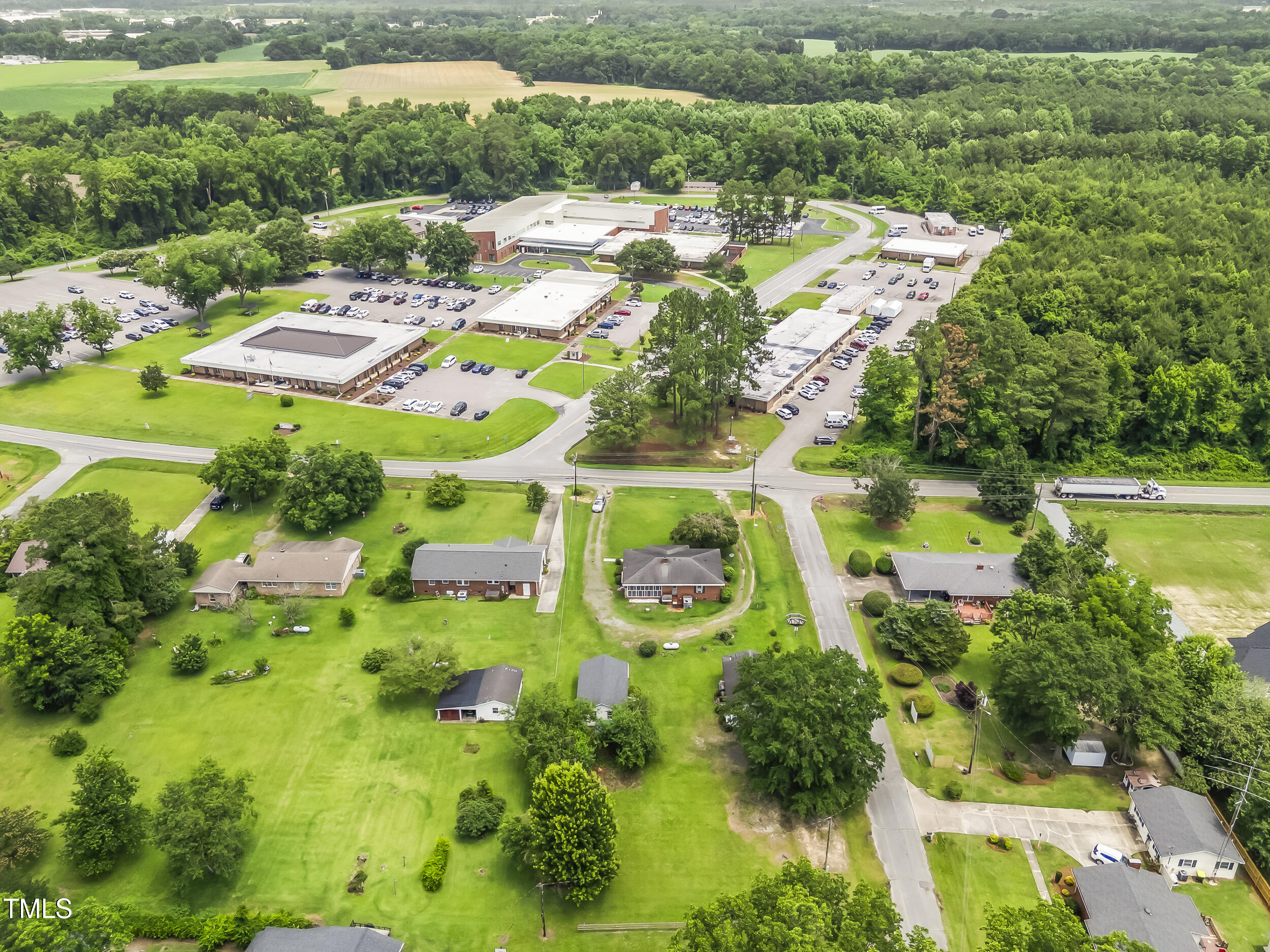 500 Rowan Road Clinton, NC 28328 - Photo 40 of 42 an aerial view of residential houses with outdoor space and pool