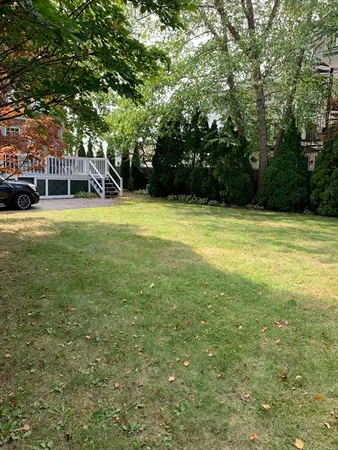 a view of a swimming pool with a garden