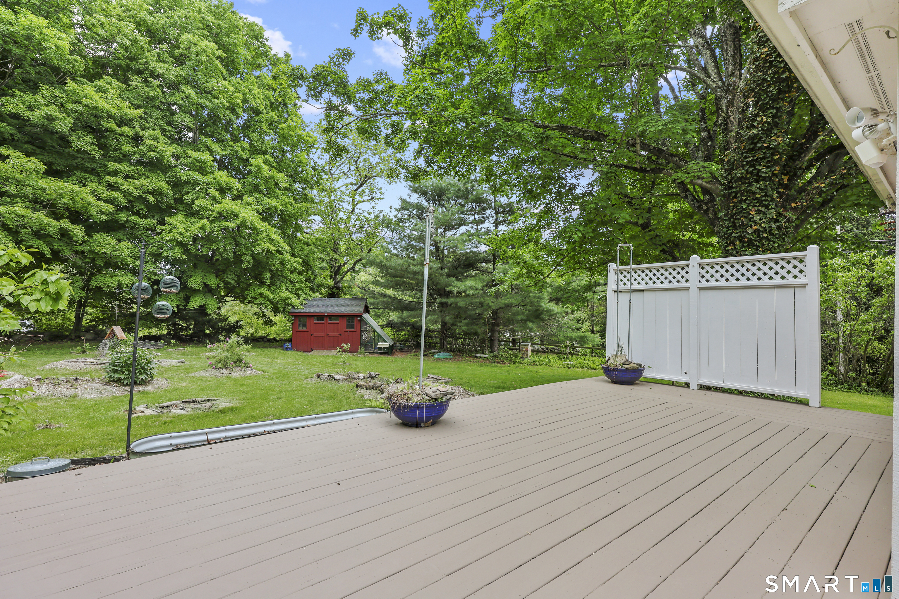 917 Hopewell Road Glastonbury, CT 06033 - Photo 34 of 39 a view of a deck and a yard in back