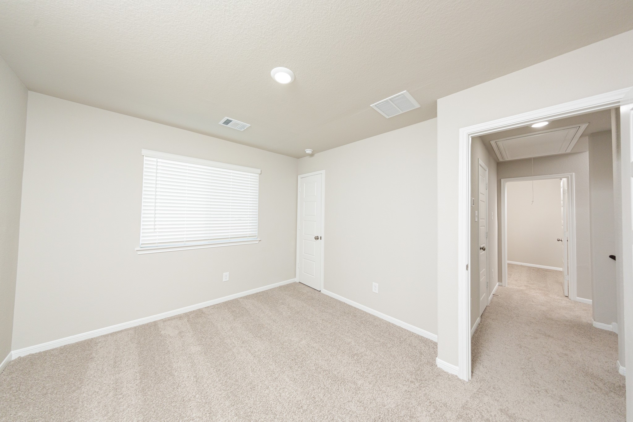 9258 Grace Rdg Drive Willis, TX 77318 - Photo 15 of 24 a view of an empty room with a window