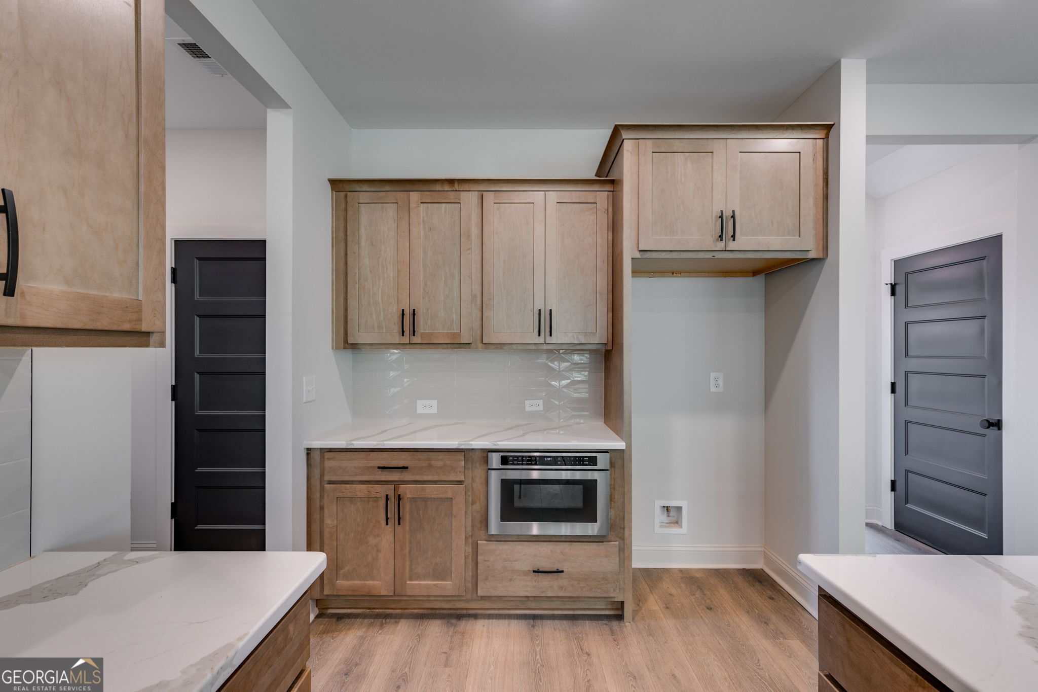 1593 Bethesda Church Road Carrollton, GA 30117 - Photo 25 of 50 a kitchen with a stove and a refrigerator