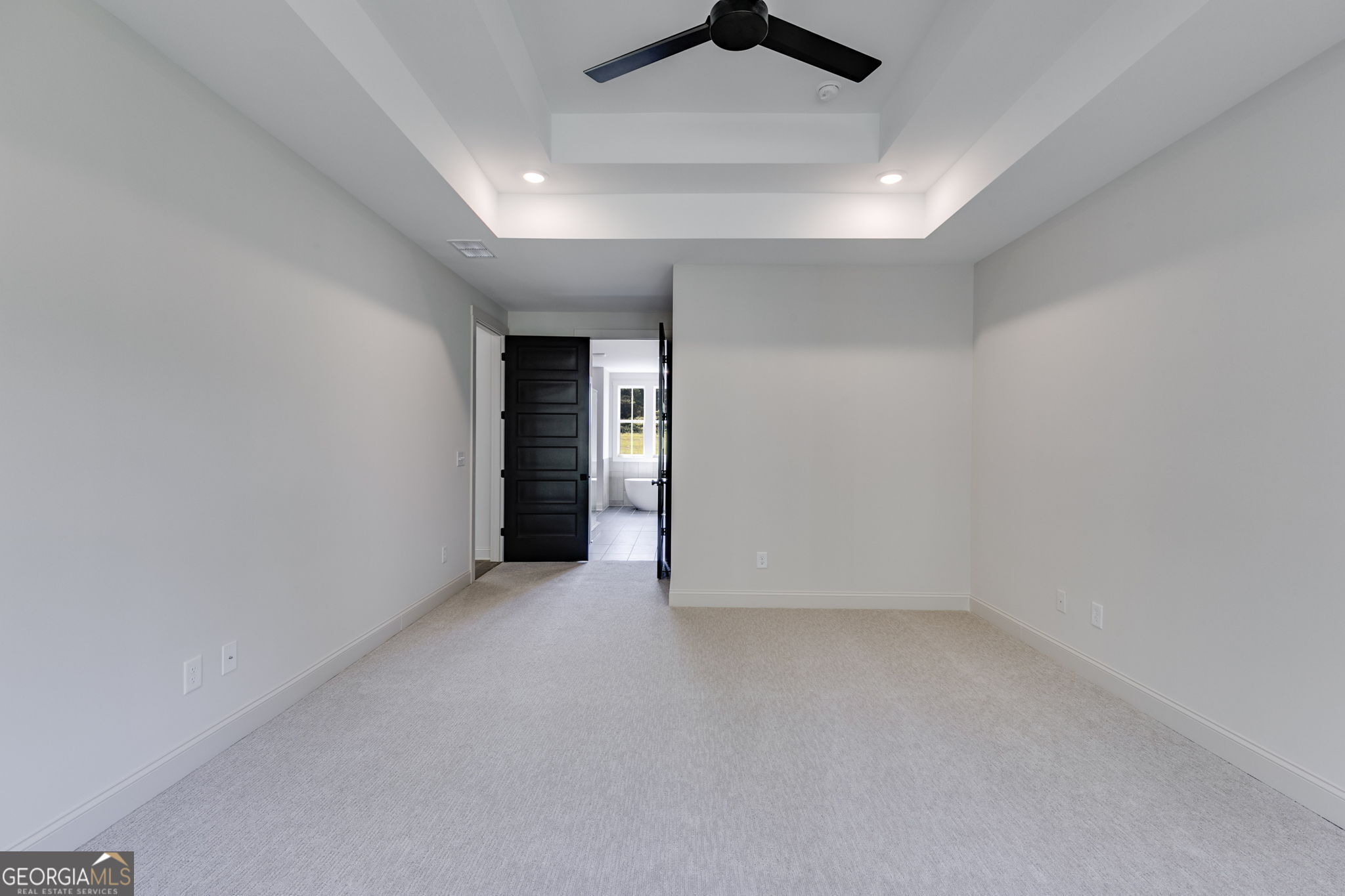 1593 Bethesda Church Road Carrollton, GA 30117 - Photo 32 of 50 an empty room with ceiling fan and window