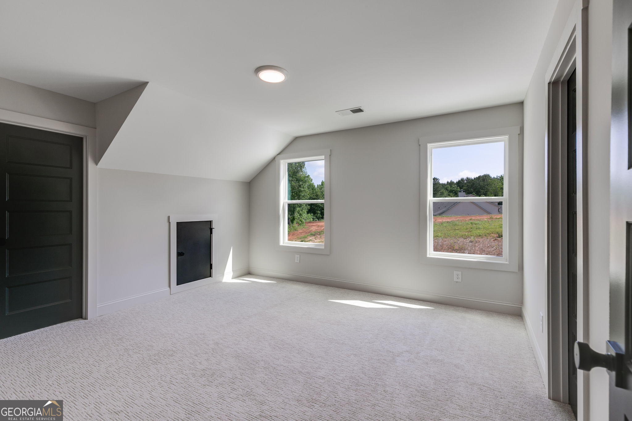 1593 Bethesda Church Road Carrollton, GA 30117 - Photo 43 of 50 an empty room with windows and closet
