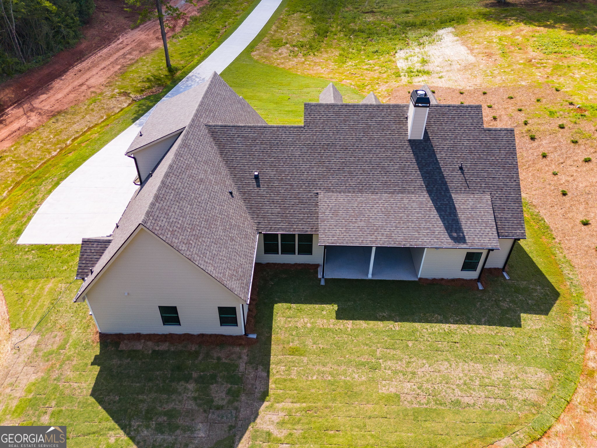 1593 Bethesda Church Road Carrollton, GA 30117 - Photo 47 of 50 a view of a house with a swimming pool