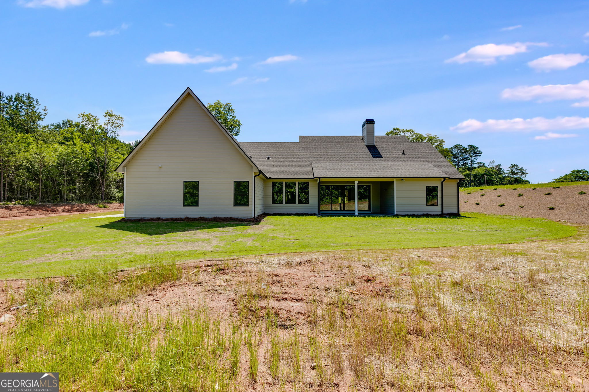 1593 Bethesda Church Road Carrollton, GA 30117 - Photo 49 of 50 a view of a house with a yard