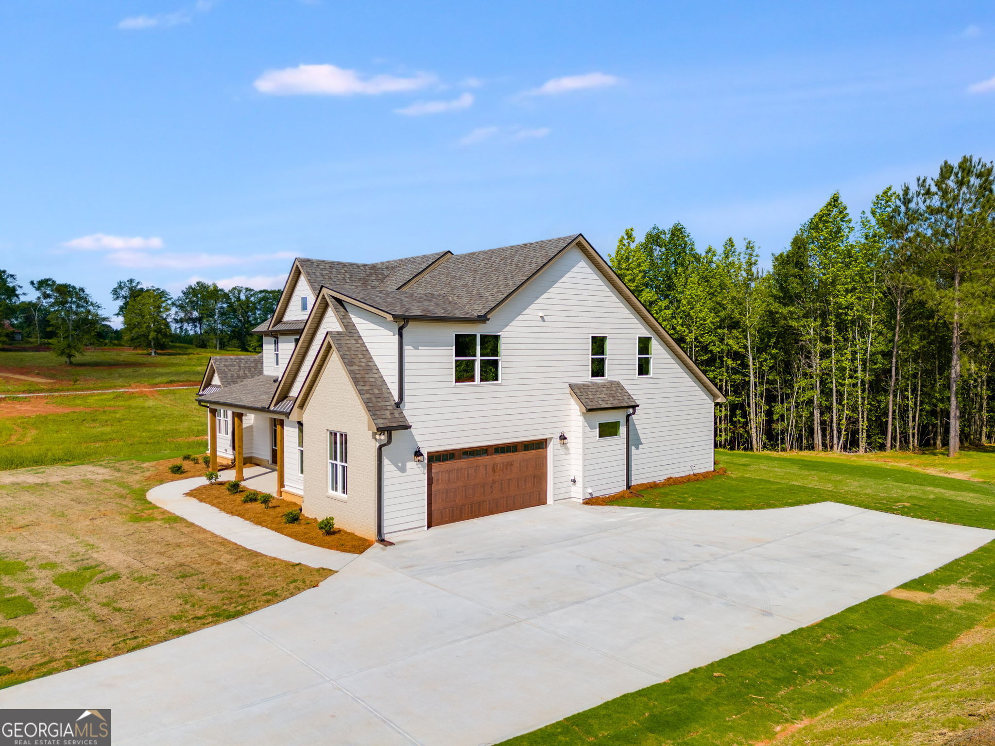 1593 Bethesda Church Road Carrollton, GA 30117 - Photo 7 of 50 a view of an house with swimming pool and yard