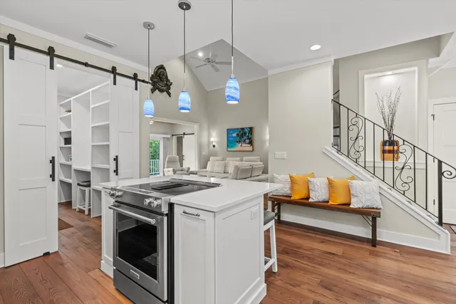 a kitchen that has a lot of cabinets in it