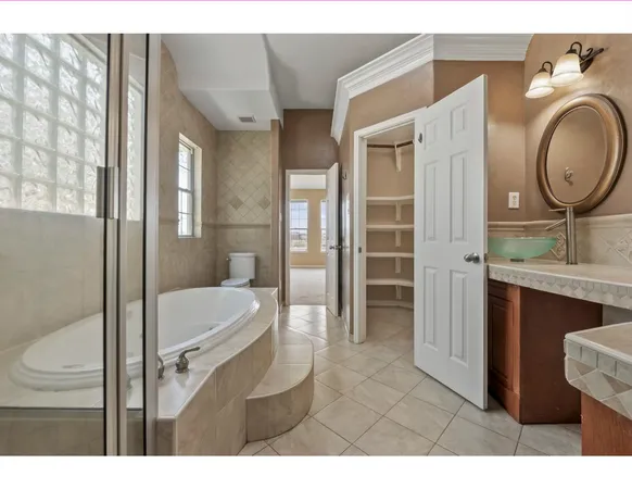 a utility room with cabinets