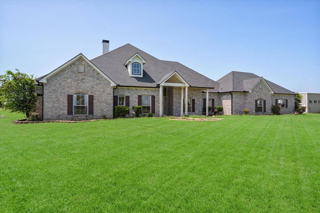 14981 West State Highway Blooming Grove, TX 76626 - Photo 1 of 40 a front view of house with yard and green space