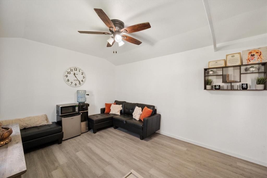 14981 West State Highway Blooming Grove, TX 76626 - Photo 36 of 40 a living room with furniture and a flat screen tv