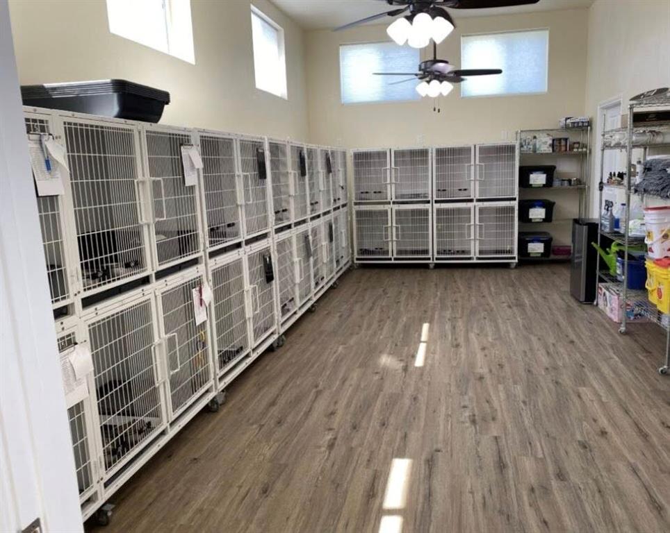 14981 West State Highway Blooming Grove, TX 76626 - Photo 40 of 40 a view of a big room with wooden floor and windows
