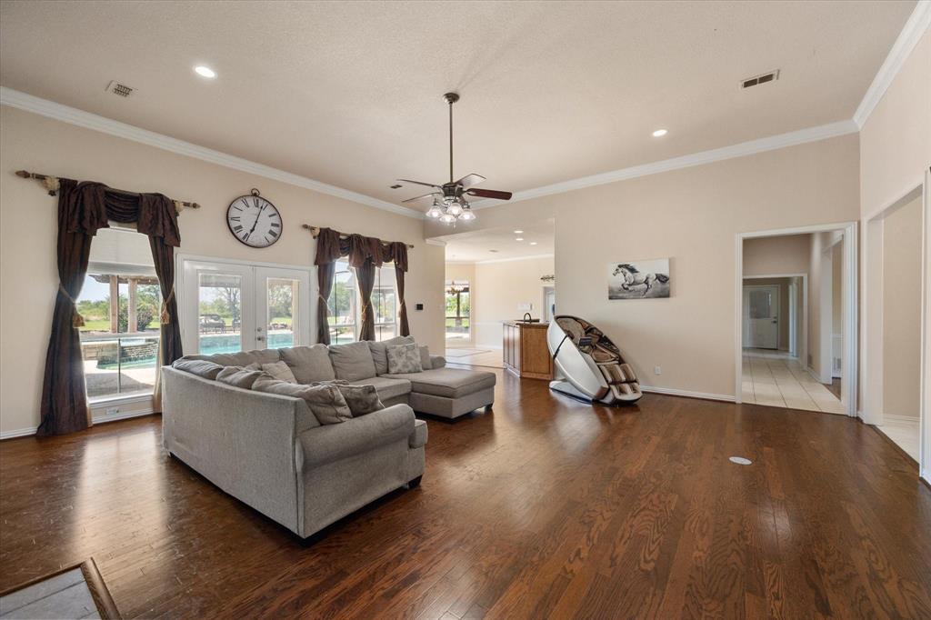 14981 West State Highway Blooming Grove, TX 76626 - Photo 9 of 40 a living room with fireplace furniture and a large window