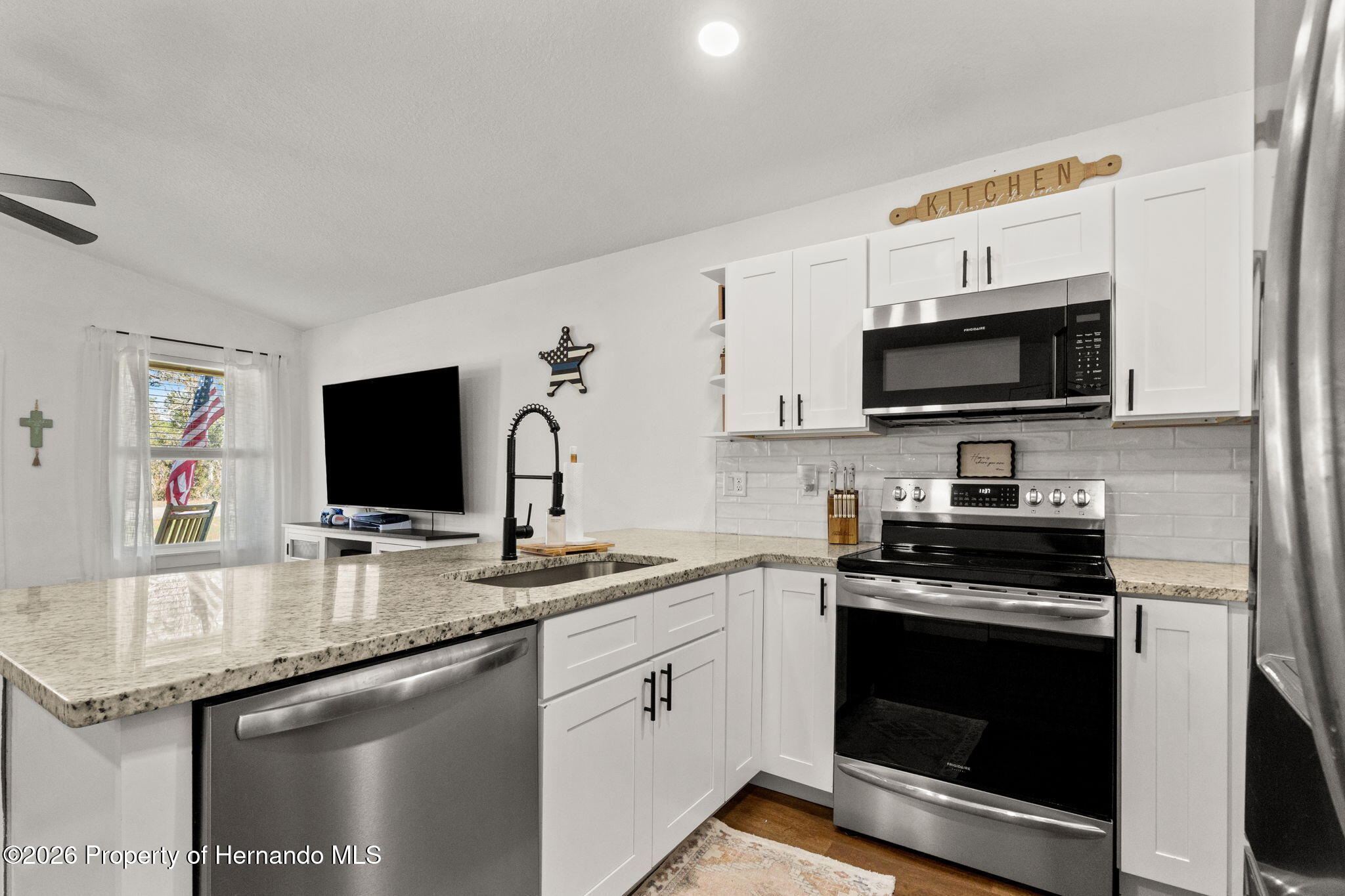 12482 Mountain Plover Road Weeki Wachee, FL 34614 - Photo 6 of 22 Kitchen