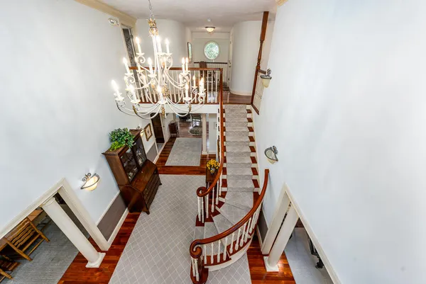 a kitchen with stainless steel appliances granite countertop a sink and dishwasher a oven with wooden cabinets