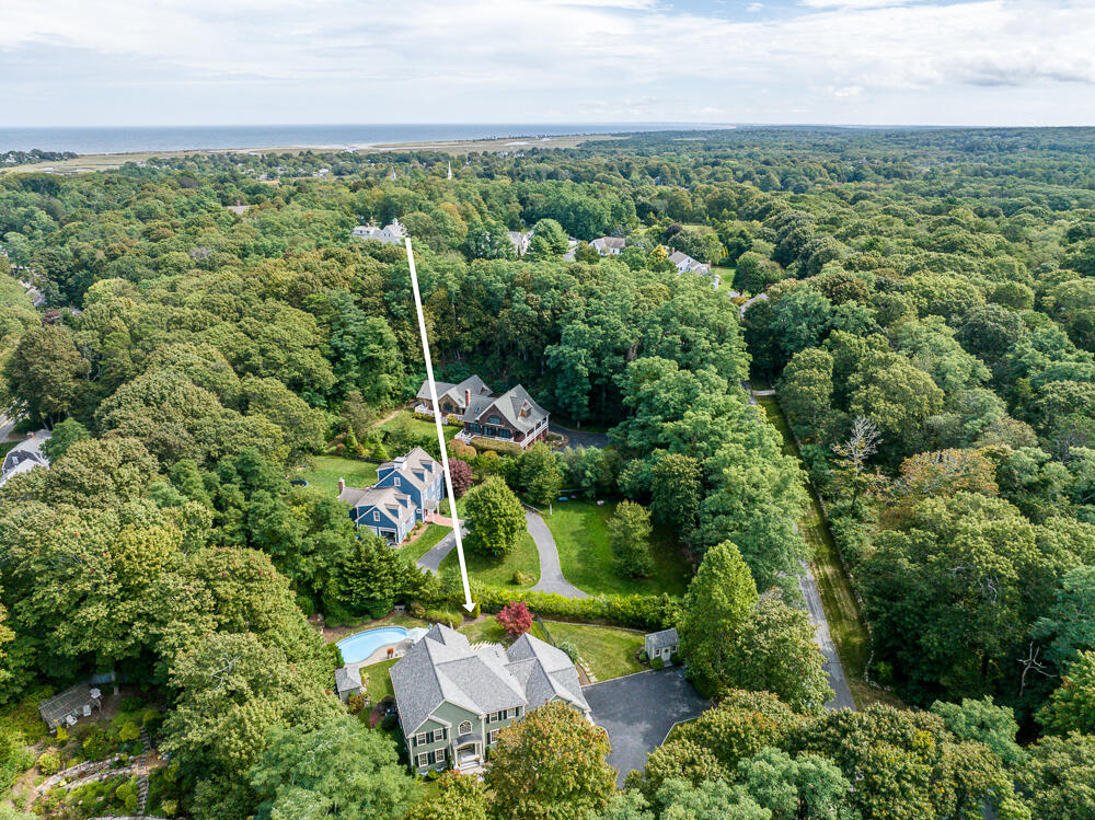 5 Pine Street Sandwich, MA 02563 - Photo 74 of 74 an aerial view of a house with a yard
