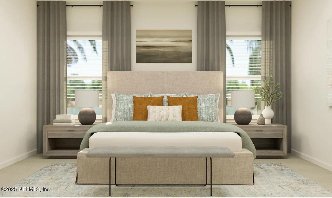 76037 Estuary Way Yulee, FL 32097 - Photo 27 of 42 a bedroom with a large bed and a window