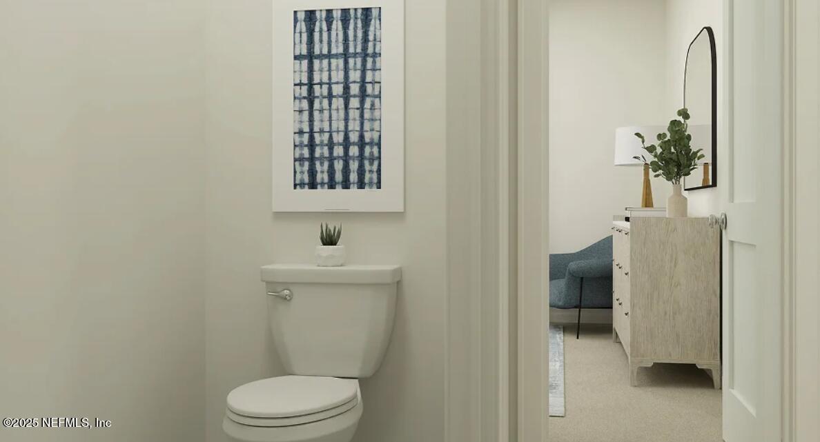 76037 Estuary Way Yulee, FL 32097 - Photo 33 of 42 a bathroom with a toilet and a sink