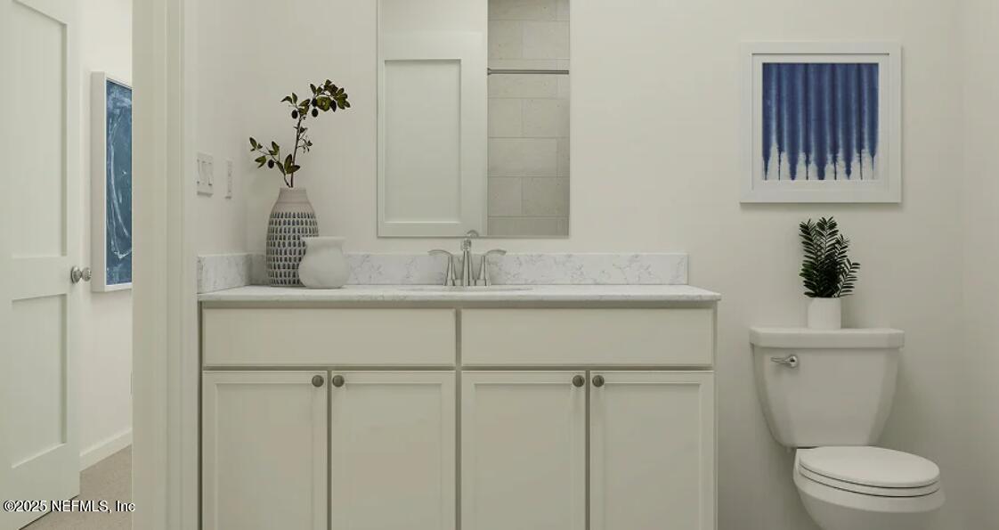 76037 Estuary Way Yulee, FL 32097 - Photo 35 of 38 a bathroom with a sink and a toilet