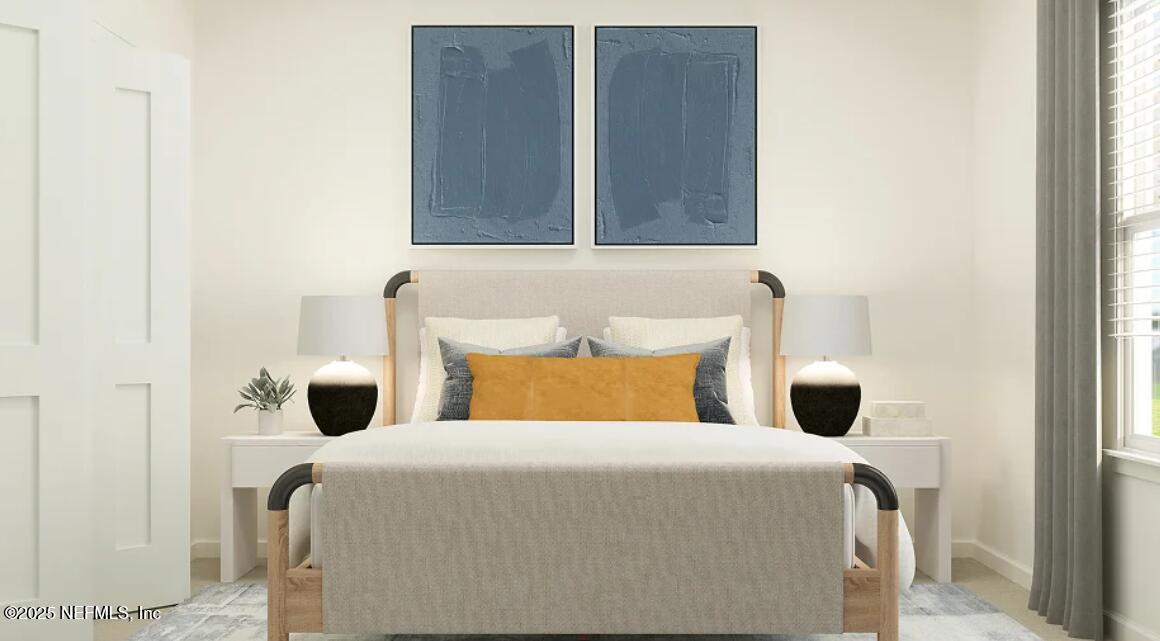 76037 Estuary Way Yulee, FL 32097 - Photo 38 of 42 a bedroom with a bed and a window