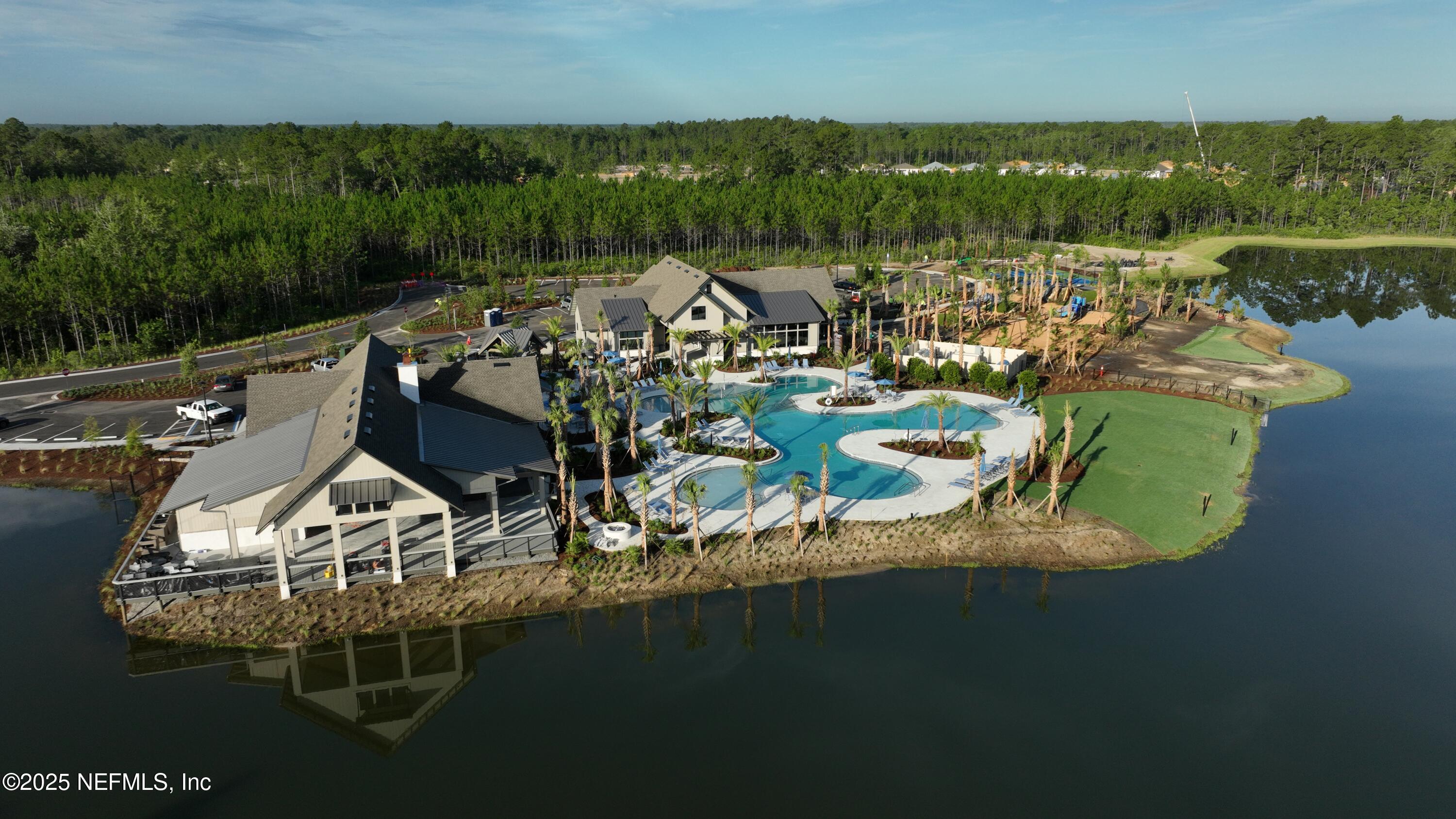 76037 Estuary Way Yulee, FL 32097 - Photo 6 of 38 a view of a lake with a mountain