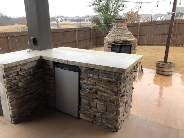 a spacious bathroom with a sink and a large window
