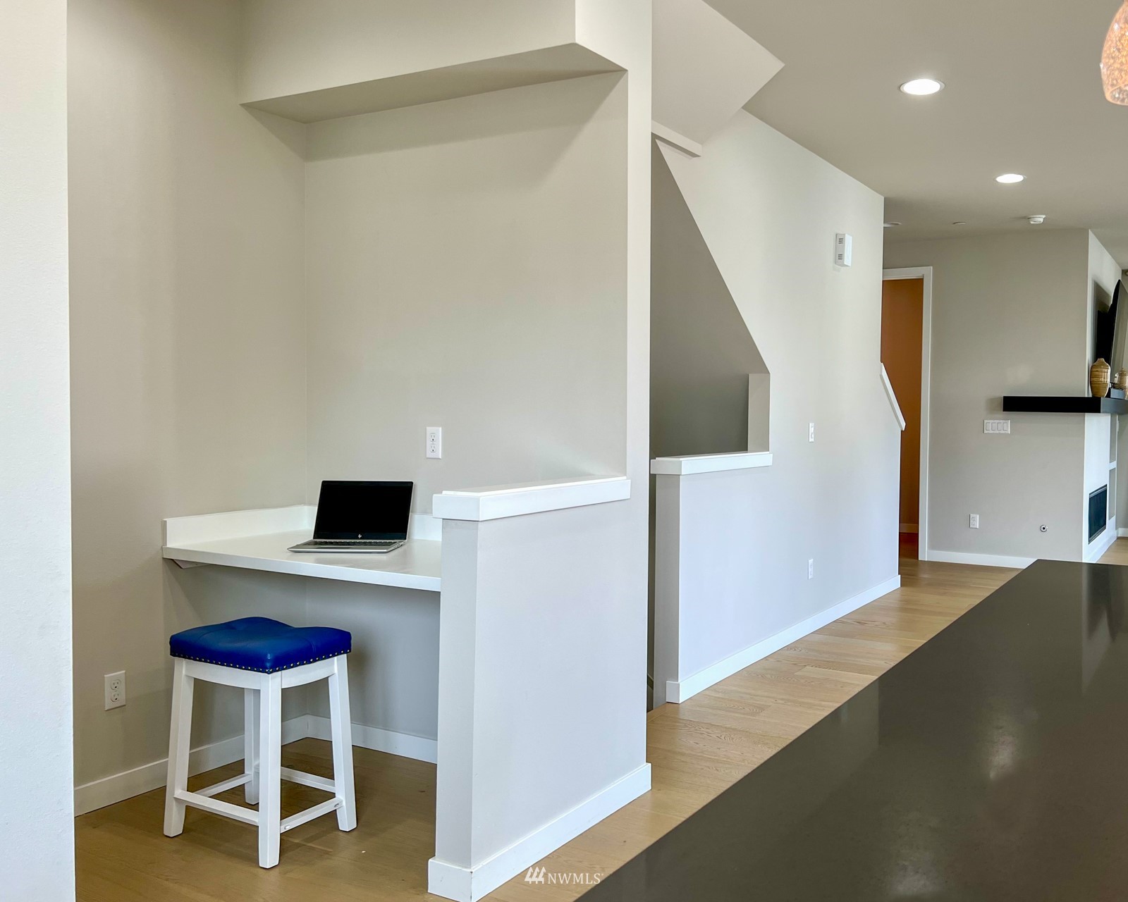 509 237th Place Southeast, Unit E Bothell, WA 98021 - Photo 20 of 35 a hallway with a table and chairs