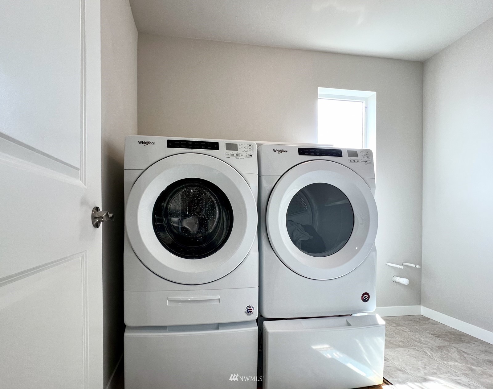 509 237th Place Southeast, Unit E Bothell, WA 98021 - Photo 25 of 35 a utility room with dryer and washer