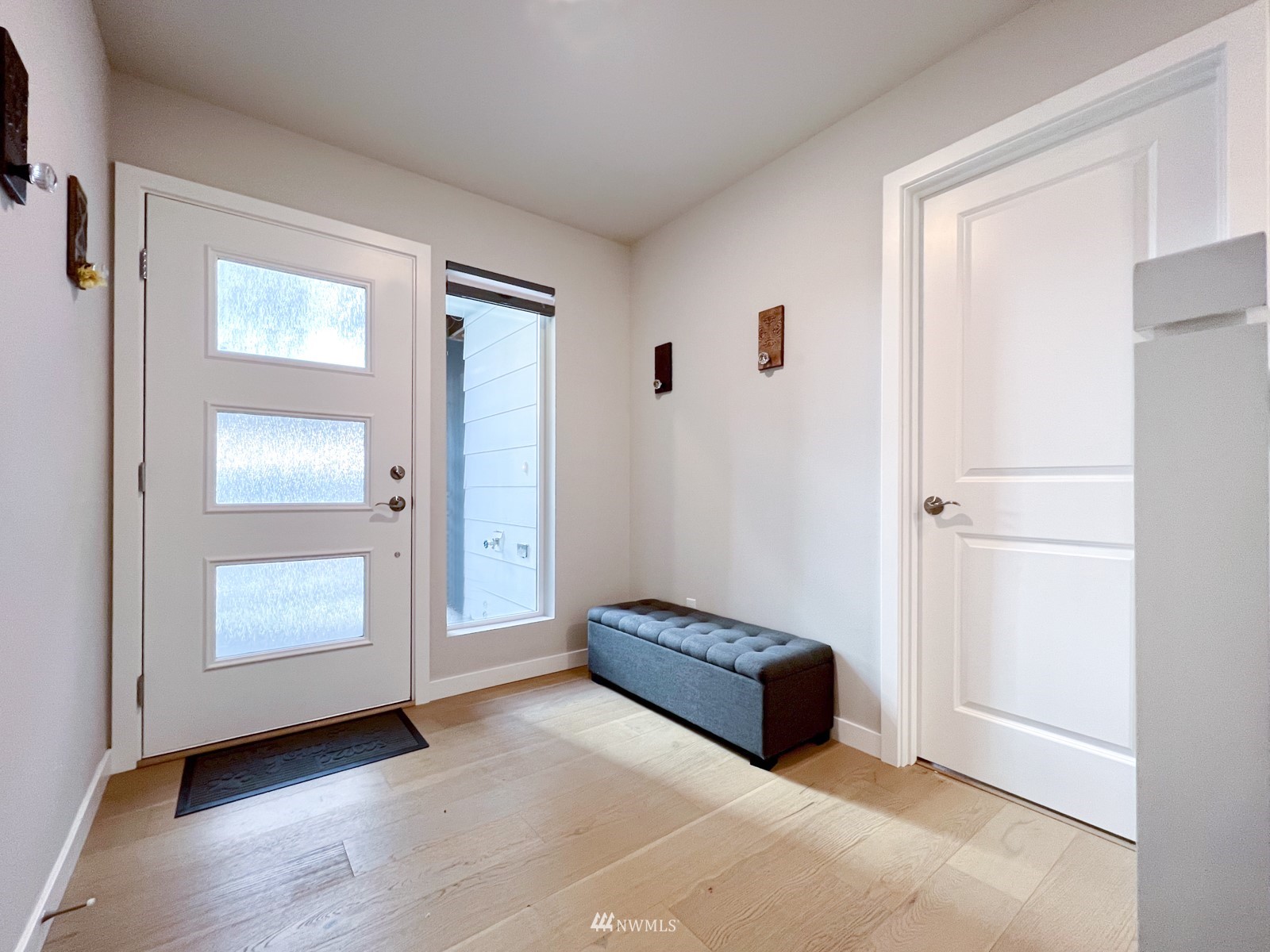 509 237th Place Southeast, Unit E Bothell, WA 98021 - Photo 6 of 35 a living room with furniture and a window