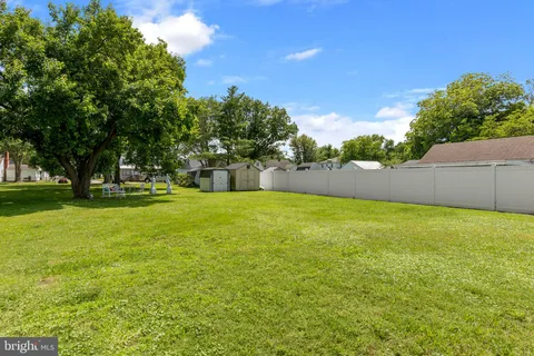 a view of building with trees in the background
