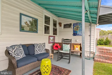 a outdoor living space with furniture and garden view