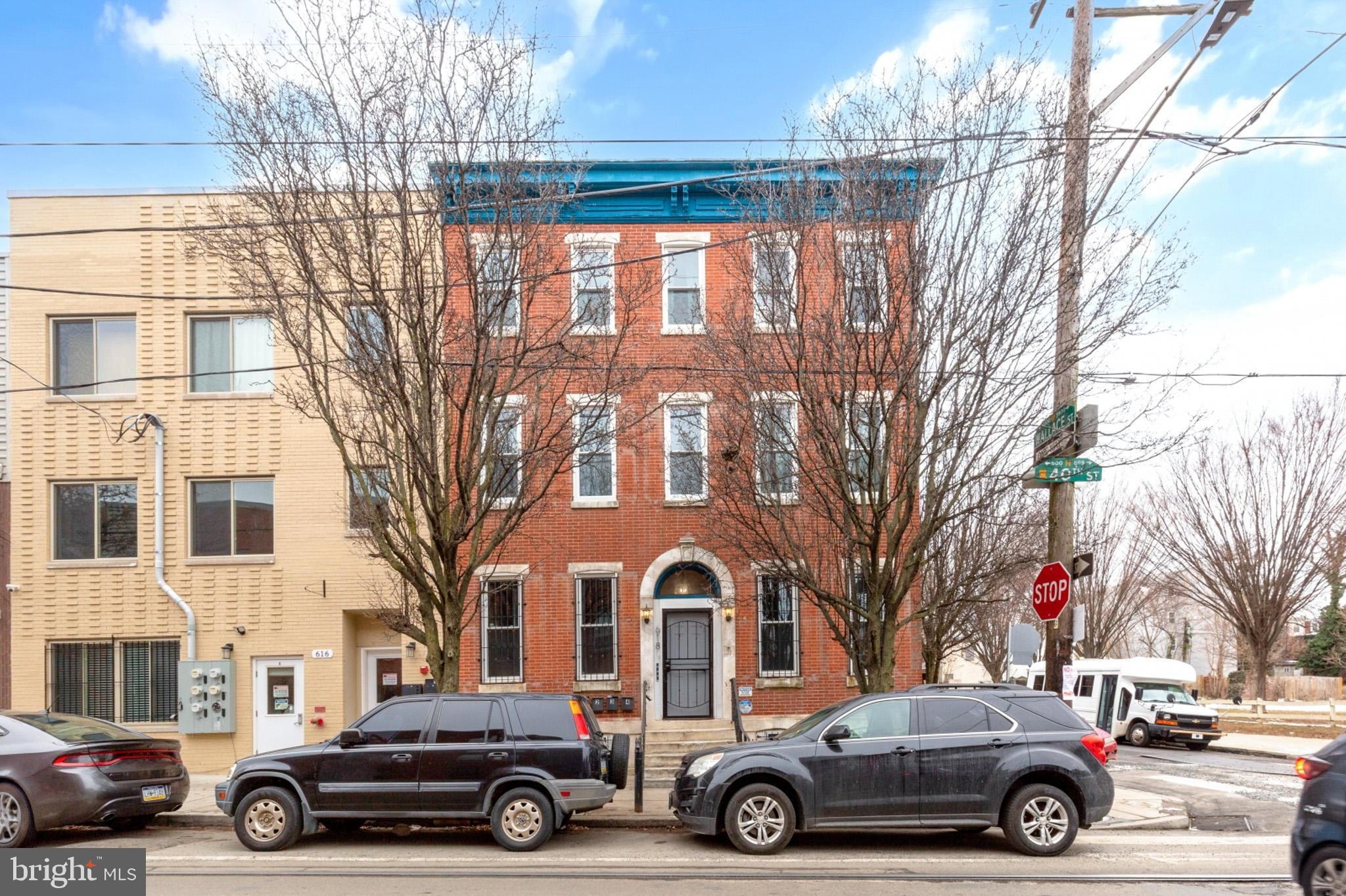 618 North 40th Street, Unit 2 Philadelphia, PA 19104 - Photo 1 of 1 a car parked in front of a building