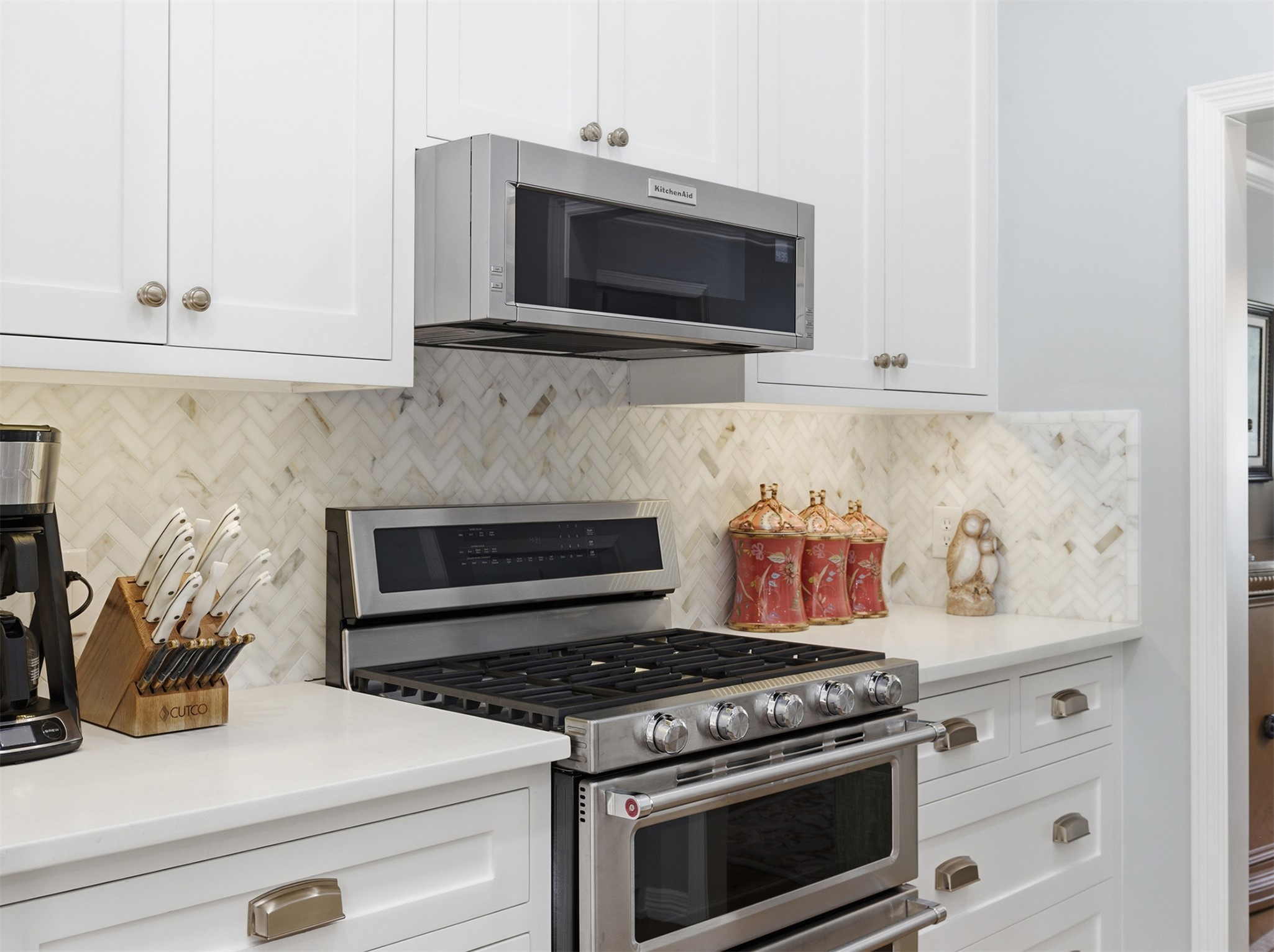 2810 Brandy Lane Georgetown, TX 78628 - Photo 12 of 38 a kitchen with microwave stove and cabinets
