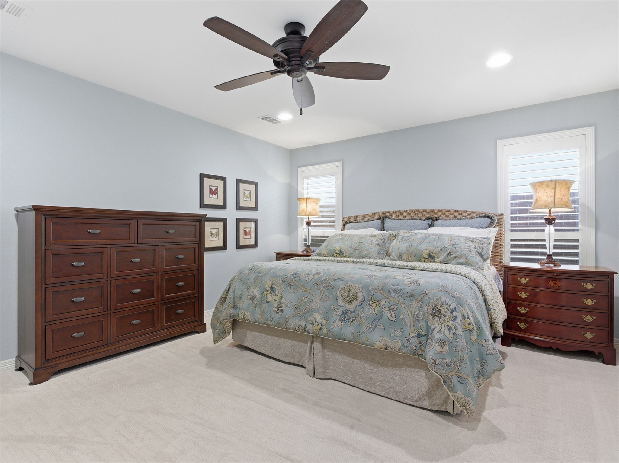 2810 Brandy Lane Georgetown, TX 78628 - Photo 18 of 38 a bedroom with a large bed and a dresser