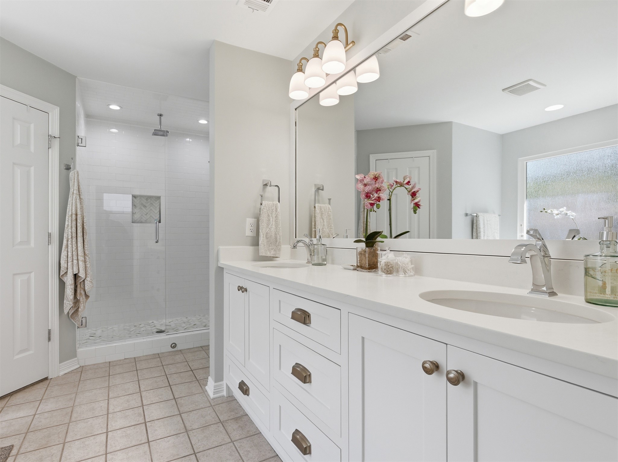 2810 Brandy Lane Georgetown, TX 78628 - Photo 20 of 38 a bathroom with a double vanity sink mirror and shower