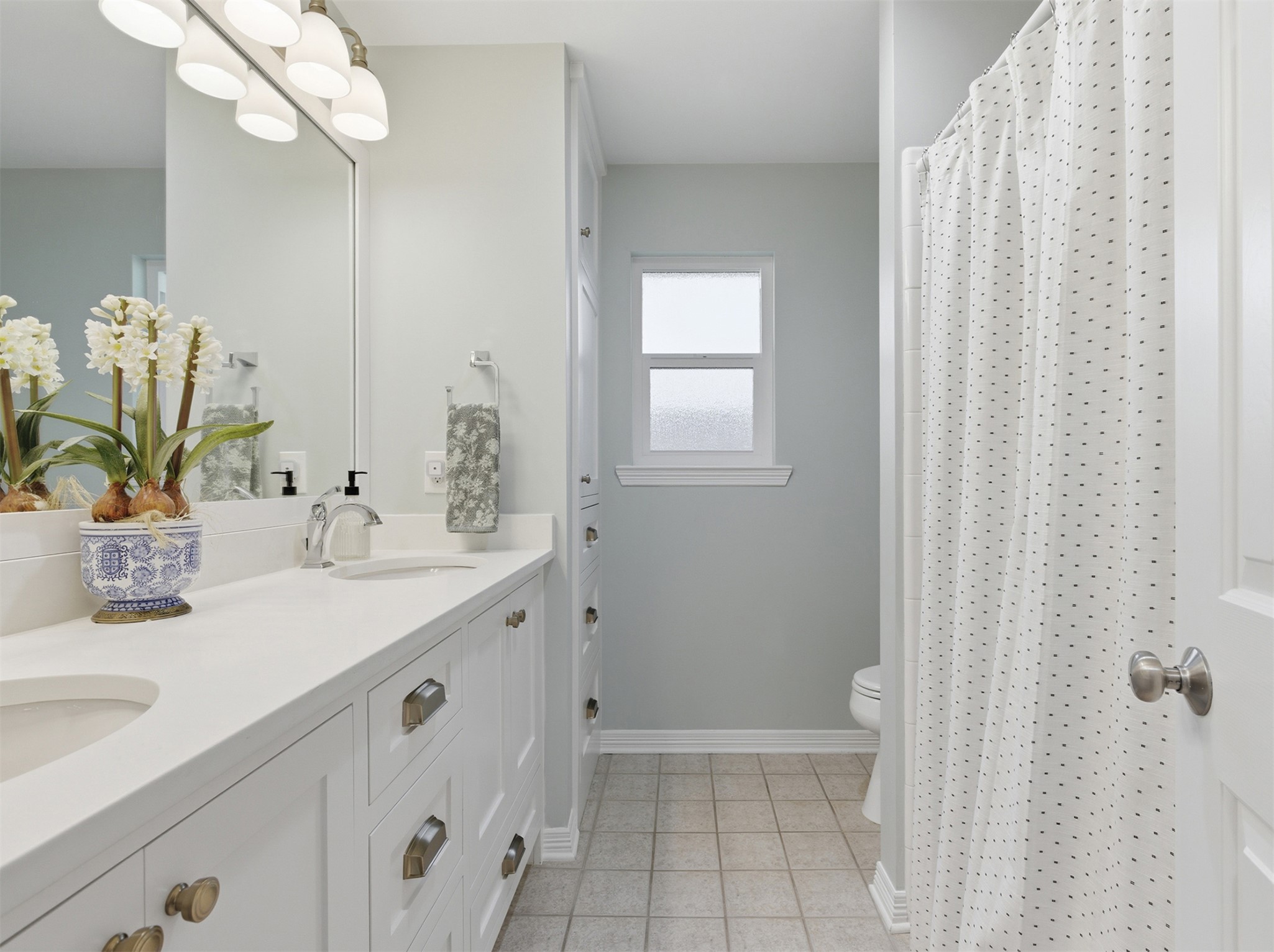 2810 Brandy Lane Georgetown, TX 78628 - Photo 26 of 38 a bathroom with a sink a vanity and a mirror