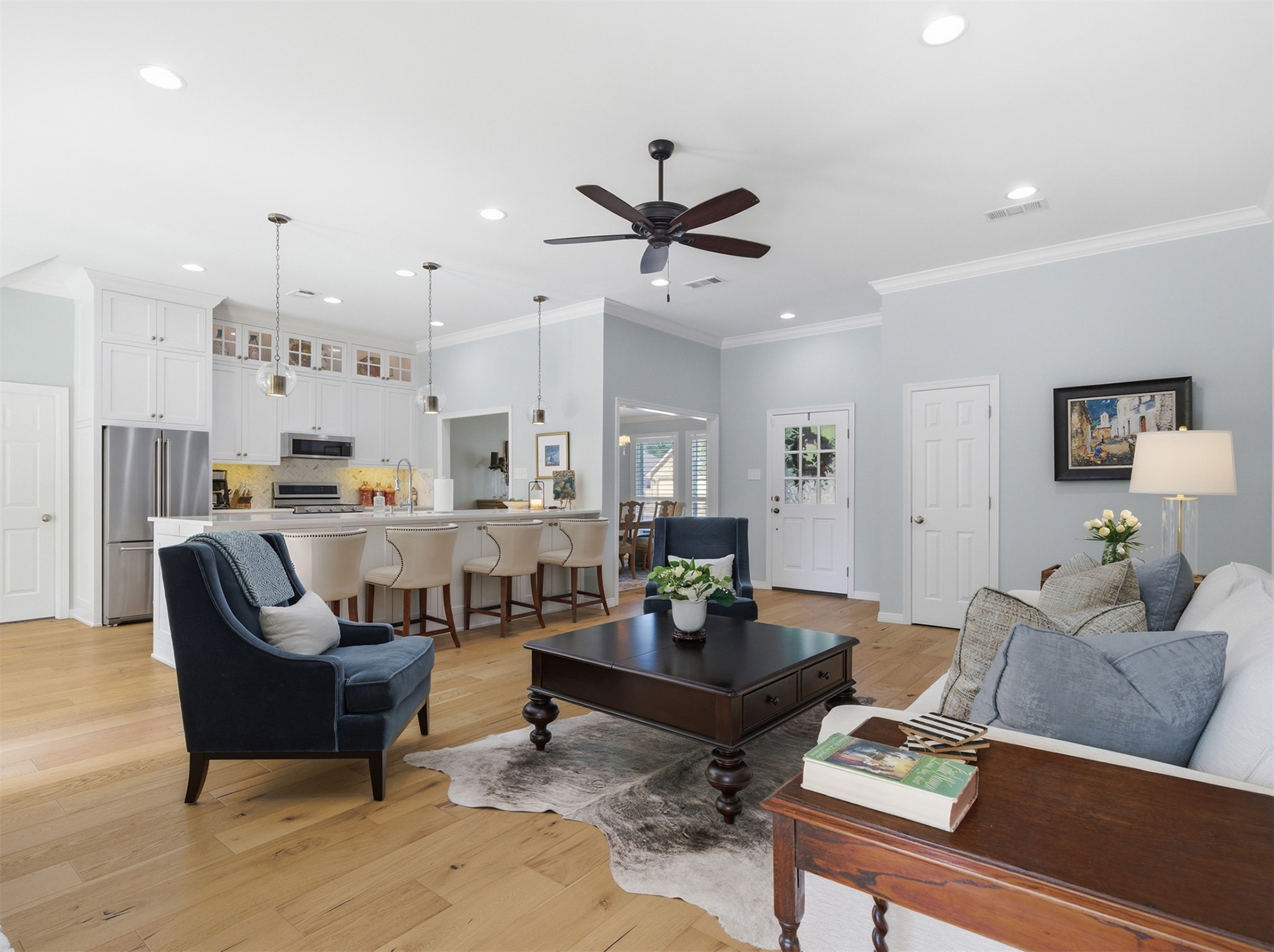 2810 Brandy Lane Georgetown, TX 78628 - Photo 7 of 38 a living room with furniture kitchen view and a chandelier