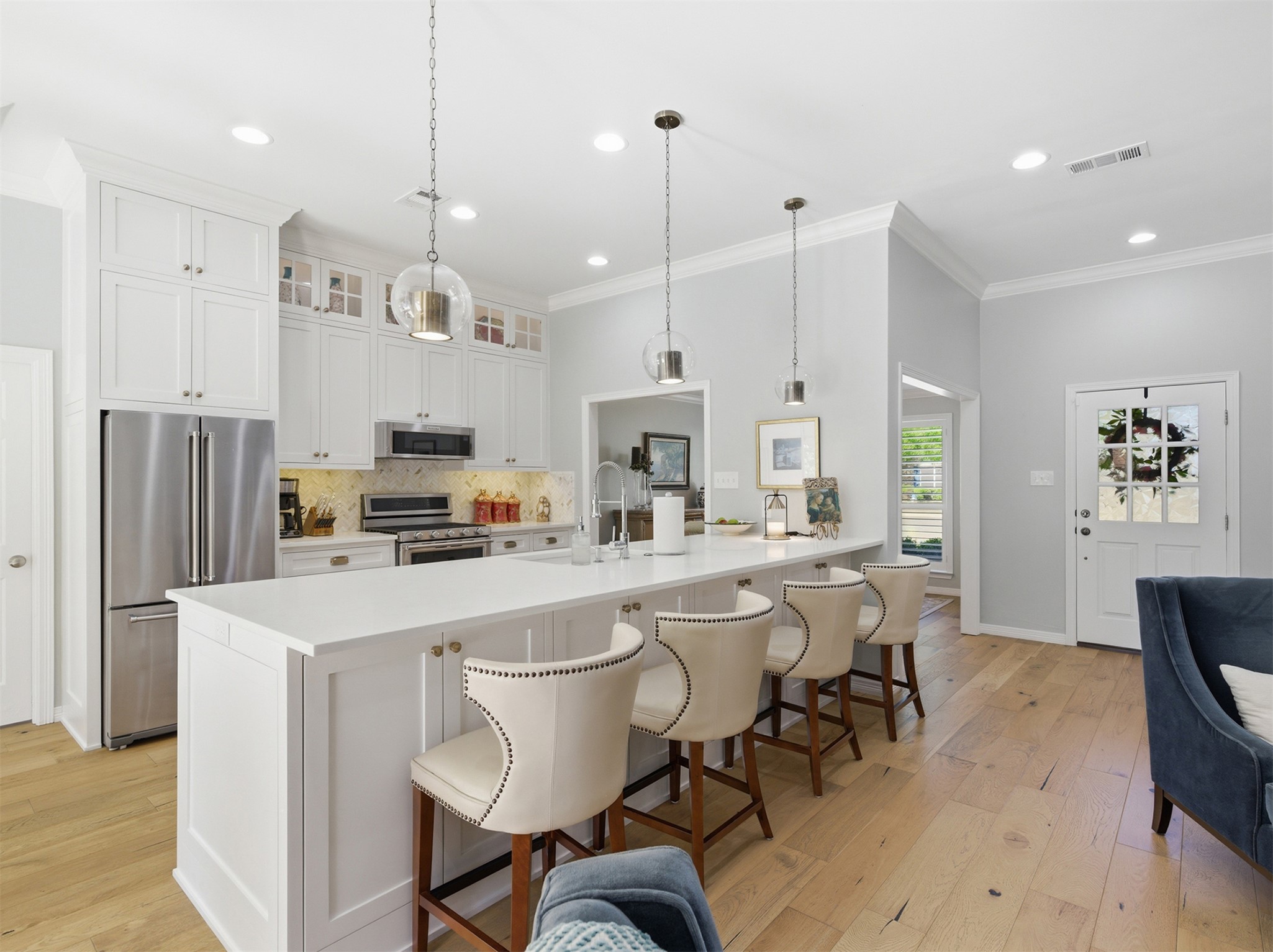 2810 Brandy Lane Georgetown, TX 78628 - Photo 9 of 38 a large kitchen with a table and chairs