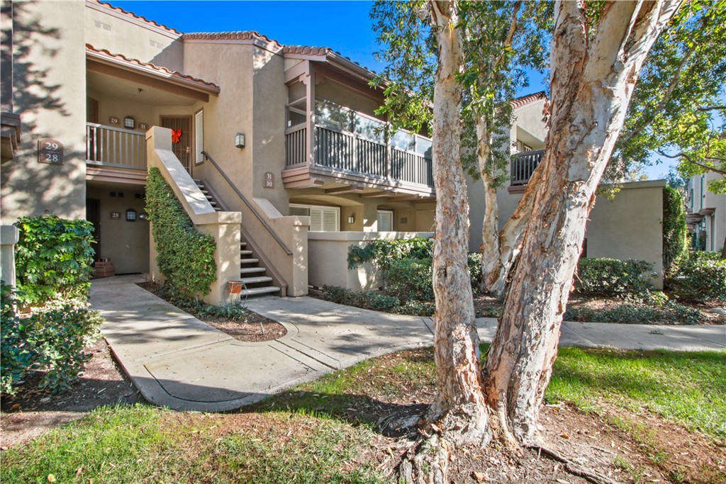 2800 Keller Drive, Unit 30 Tustin, CA 92782 - Photo 1 of 9 front view of a house with a yard