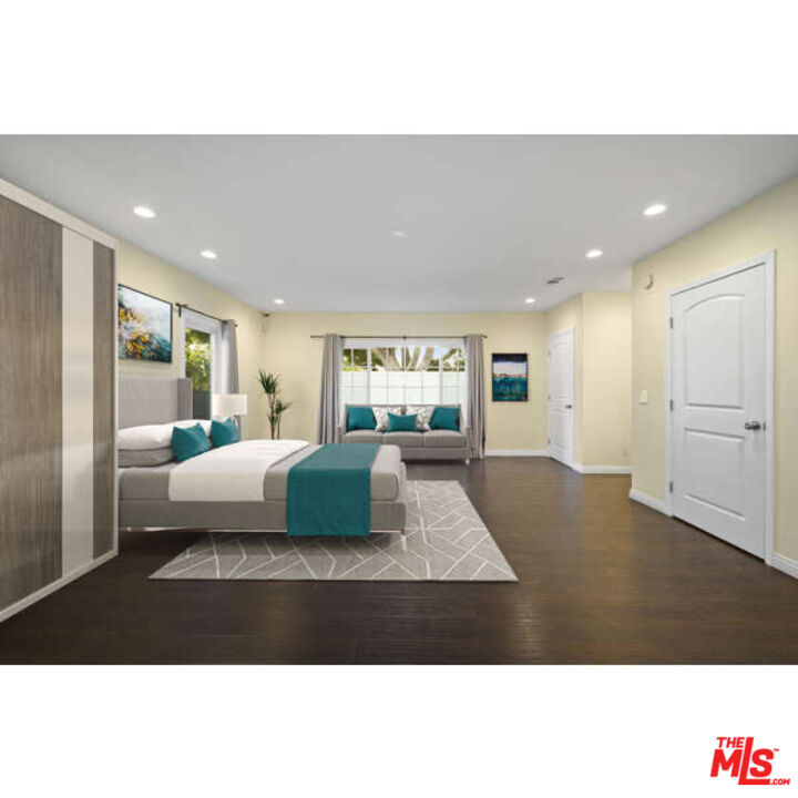 2148 Kelton Avenue Los Angeles, CA 90025 - Photo 12 of 36 a living room with furniture and a table