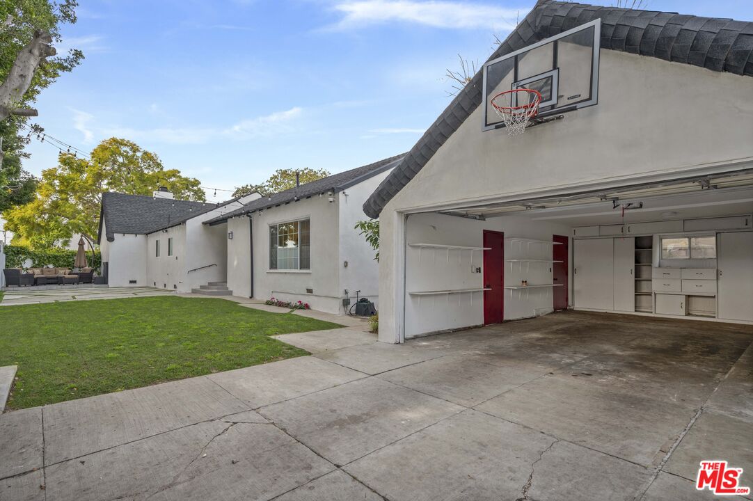 2148 Kelton Avenue Los Angeles, CA 90025 - Photo 31 of 36 a view of a house with a yard
