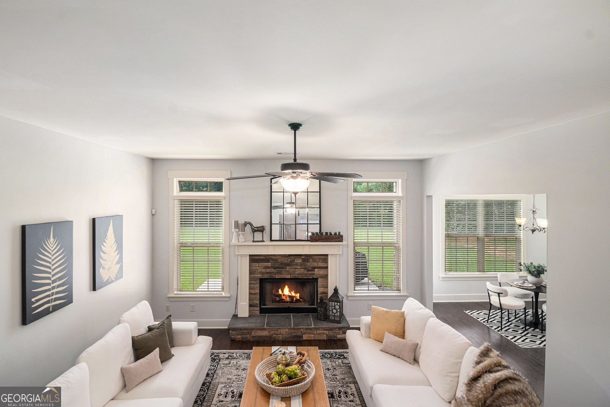 466 Austin Storey Circle Newnan, GA 30263 - Photo 12 of 38 a living room with furniture and a fireplace