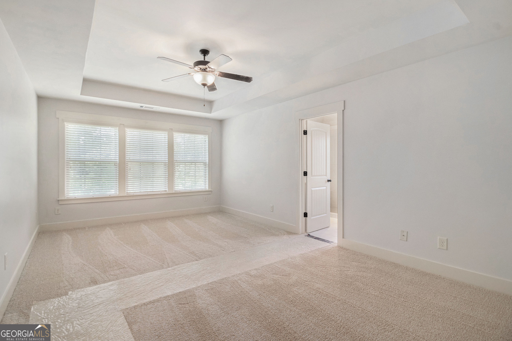 466 Austin Storey Circle Newnan, GA 30263 - Photo 21 of 38 a view of an empty room with a window