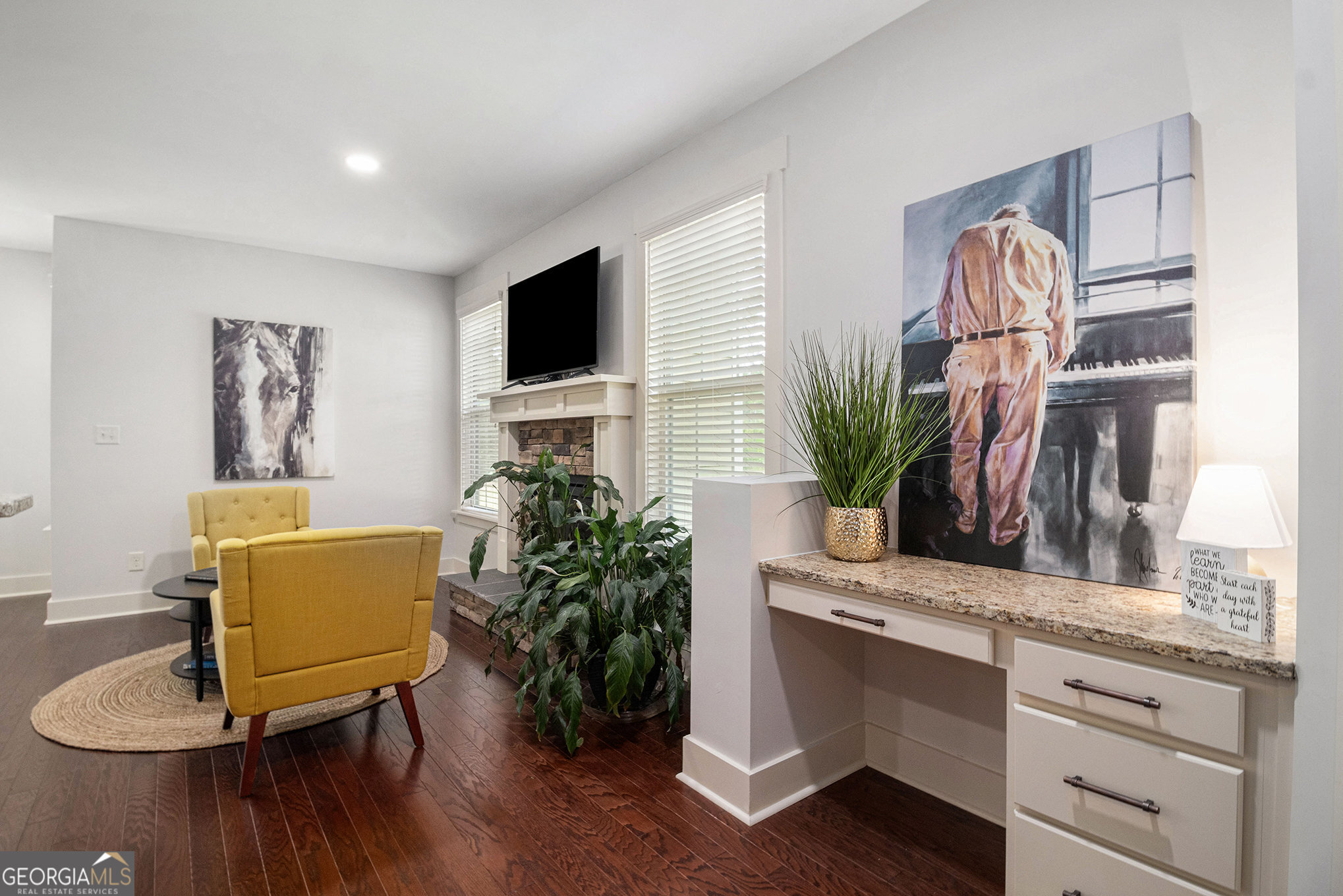 466 Austin Storey Circle Newnan, GA 30263 - Photo 9 of 38 a living room with furniture and a potted plant