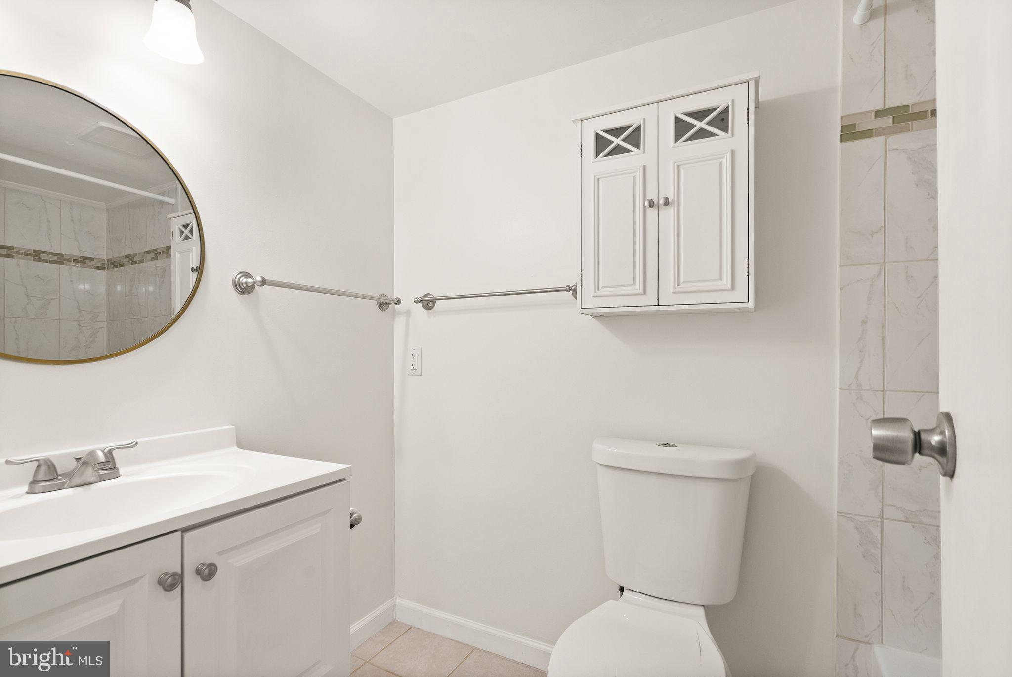 2042 Royal Fern Court, Unit 1B Reston, VA 20191 - Photo 13 of 51 Fresh paint in the updated bathroom