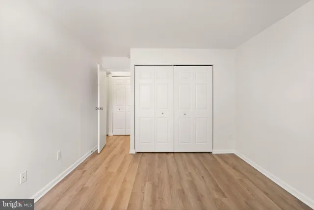 a front view of building with yard