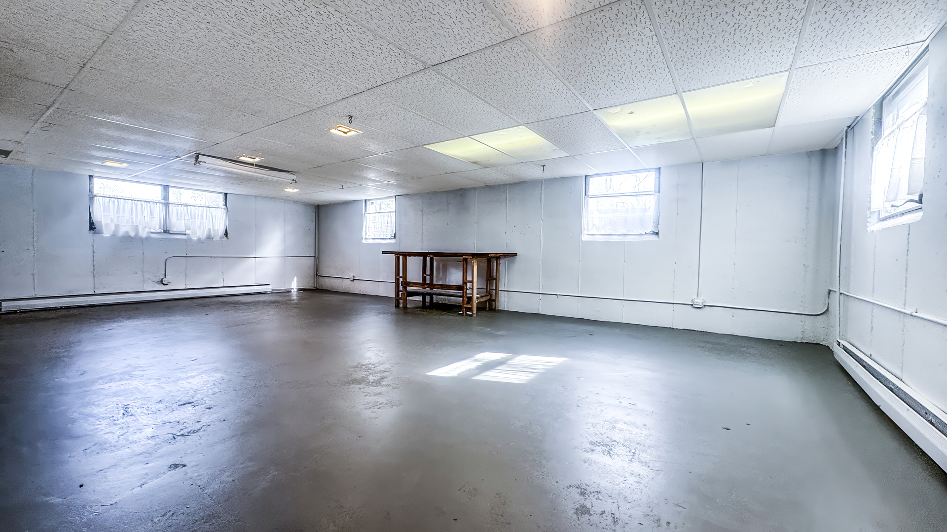 1848 North Sheridan Road Waukegan, IL 60087 - Photo 25 of 27 an empty room with wooden floor and windows