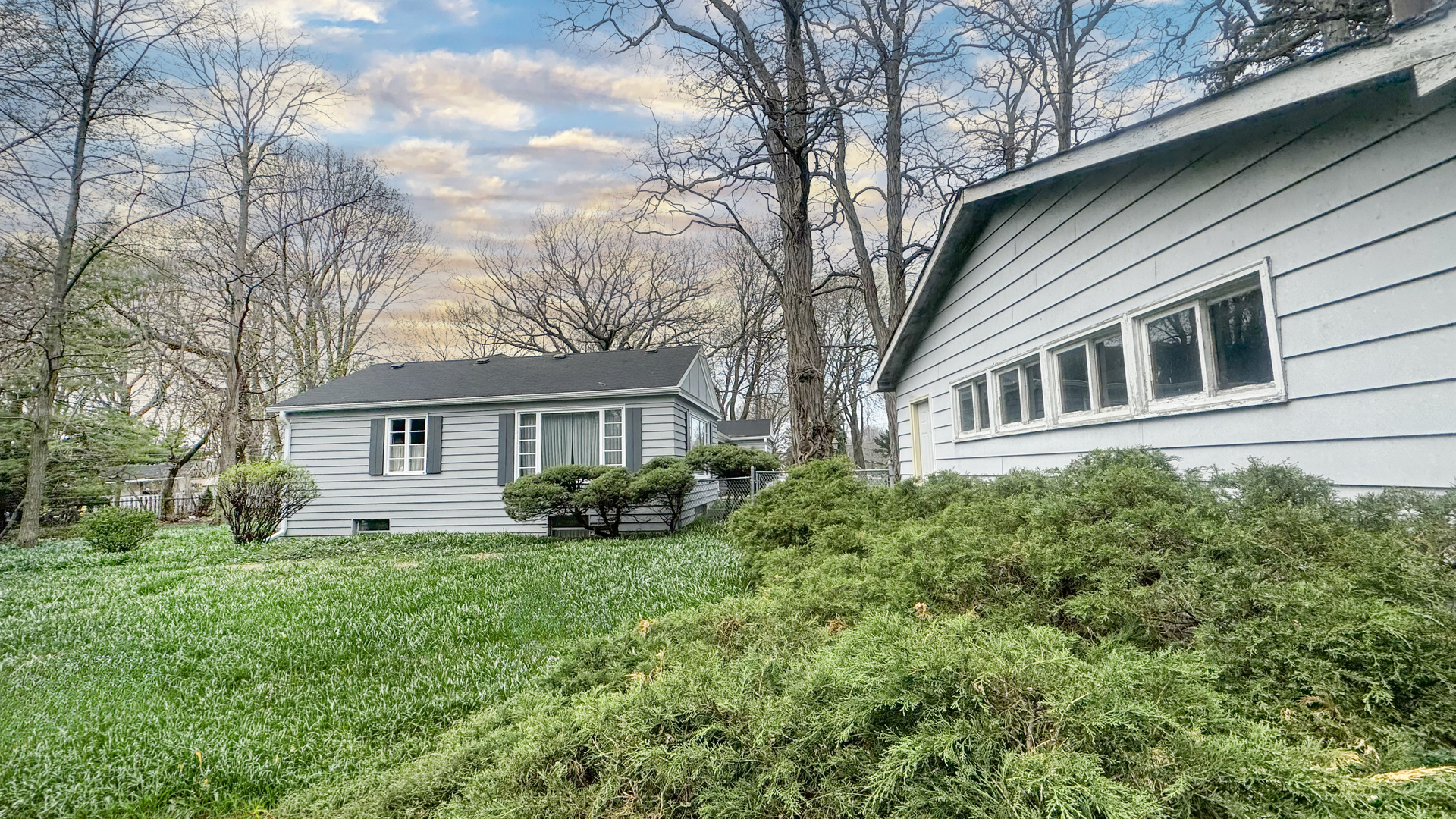 1848 North Sheridan Road Waukegan, IL 60087 - Photo 8 of 27 a front view of a house with a yard and trees