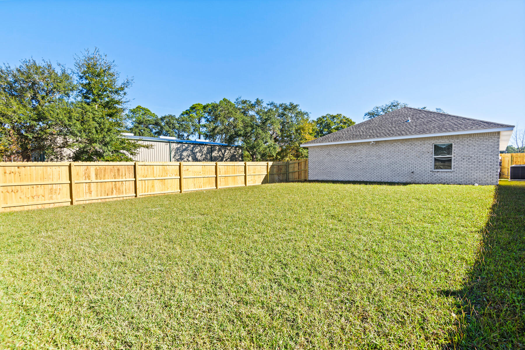 46 Winfield Street Niceville, FL 32578 - Photo 30 of 32 a view of a backyard