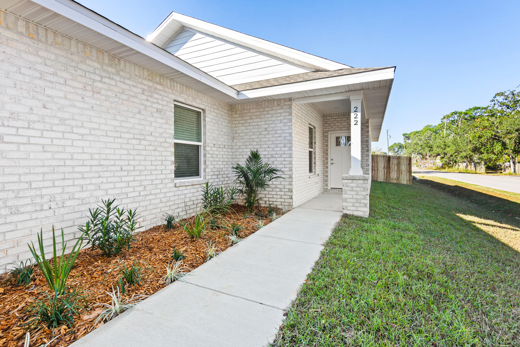 46 Winfield Street Niceville, FL 32578 - Photo 3 of 32 a front view of a house with garden